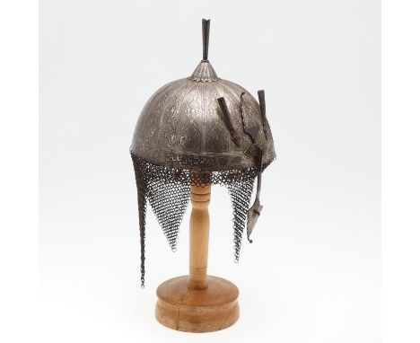 With a decorative fluted bowl inlaid with scrolling silver and gilt damascene type decoration, the rim with islamic script. t