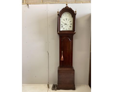 A George III mahogany eight day longcase clock, the arched silvered dial inscribed Tempus Fugit, height 232cm. Condition - go