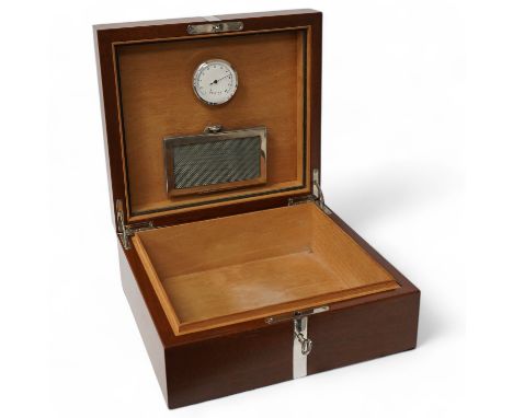 An Asprey & Co. silver mounted humidor, 2005, with key. 26cm wide. Condition - fair to goodWoodwork good; silver mounts with 