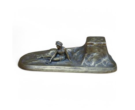 An Art Nouveau bronze ‘bathing lady’ inkwell, 26cm wide. Condition - good