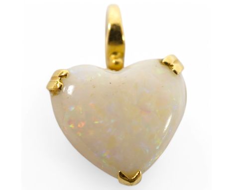 A modern 18ct gold mounted heart shaped white opal pendant, overall 20mm, gross weight 3.2 grams. Condition - fair to good