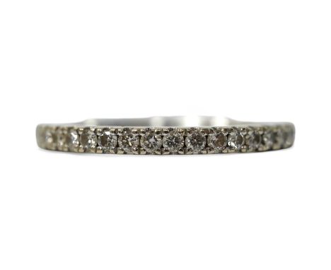A modern Vera Wang 18ct white gold and diamond chip set half eternity ring, size K, gross weight 2.6 grams. Condition - good
