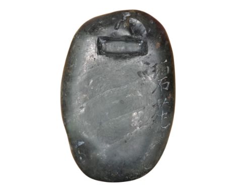 A Chinese literati ink stone with calligraphy, 16cm wide. Condition - fair