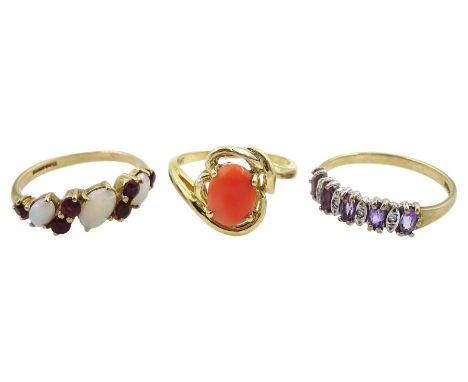 Gold single stone coral ring, stamped 14K, gold amethyst and diamond ring and an opal and garnet, both hallmarked 9ct