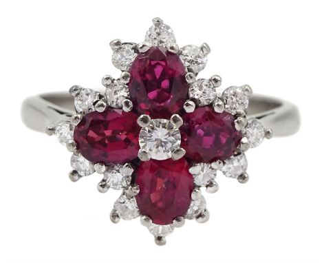White gold oval ruby and round brilliant cut diamond cluster ring, stamped 18ct