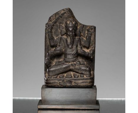 Dimensions: Height 10 cm Wide 7 cm Depth 3 cm without baseWeight: 400,6 grams with base This finely carved black stone stele 
