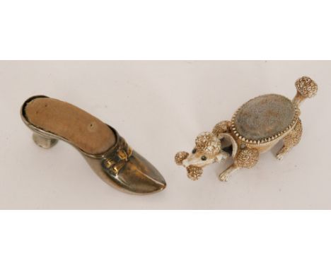 A late 19th to early 20th Century painted gilt metal novelty pin cushion, modelled in the form of a crouching poodle, with bl