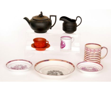 A 19th Century Wedgwood black basalt teapot with Sybil finial S/D together with a black basalt cream jug with engine turned d