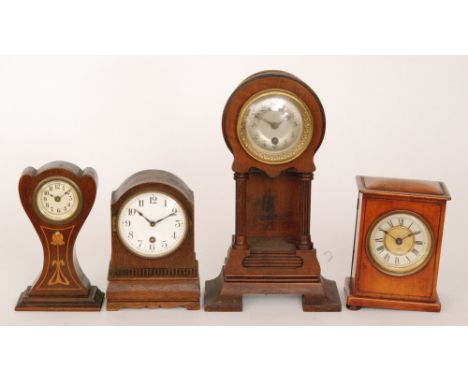 A small Edwardian Art Nouveau inlaid mantle clock together with a similar reeded pillar clock, a mahogany cased mantle clock 