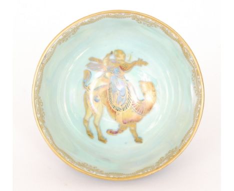 A 1930s Wedgwood Ordinary Lustre bowl designed by Daisy Makeig Jones, the interior with a Wu Sun barbarian holding a chinese 