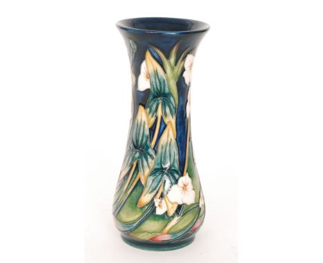 A Moorcroft Pottery vase of slender waisted form decorated in the Elfin Beck pattern designed by Philip Gibson, printed and p