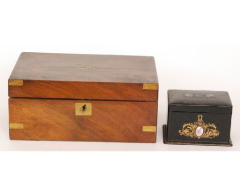 A Victorian figured walnut brass cornered writing slope together with an inlaid papier mache two division tea caddy, width 17