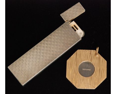 A 1960s 9ct mounted stainless steel cigar cutter of hexagonal outline with textured finish, London 1969 and a rectangular eng