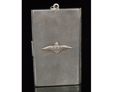 A hallmarked silver triple fold rectangular card case with engine turned decoration and applied RAF wings to front, length 9.