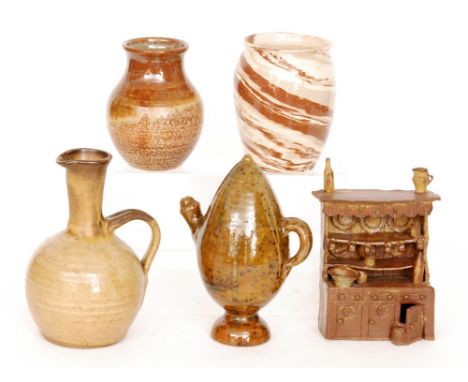 A studio pottery model of a Welsh Dresser with plates, mugs and jugs decorated in a brown glaze, height 21cm together with a 