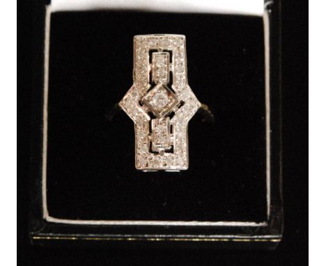 A 9ct hallmarked Art Deco style diamond cluster ring, elongated rectangular diamond pave set pierced head to knife edged shou