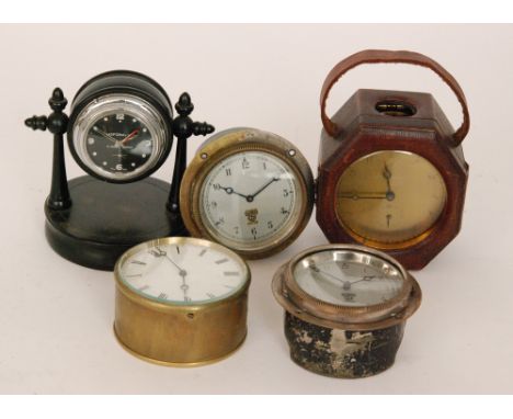 A Moparmatic gimble operated ebonised mantle clock together with two Smith's car clocks, a French circular brass cased clock 