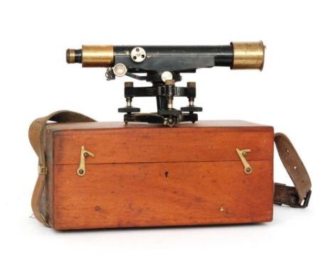 A 1920s or later surveyor's level by E Watts cased together with a tripod and adjustable rule.