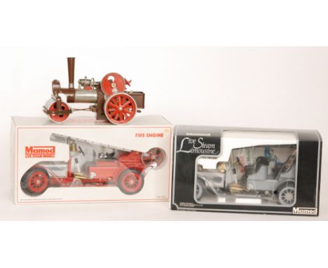 A Mamod live steam fire engine in red together with a grey painted limousine, boxed and a steam roller (3)