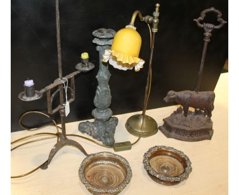 Works of art, to include an iron candleholder, a cow door stop, a candle stick, a lamp and a pair of silver plated coasters, 