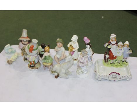 Collection of porcelain figures, consisting of Mansion House style dwarfs, Royal Worcester 'At The Seaside' AF, 'Polly Put Th