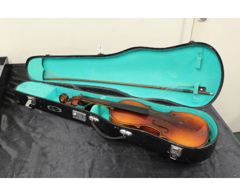 Czechoslovakian copy of a Stradivarius violin, with bow and violin case