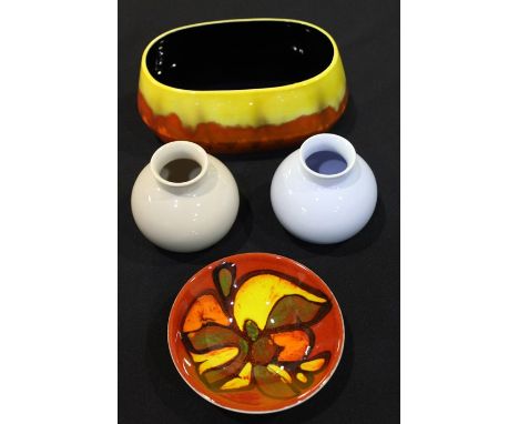 Poole pottery, to include a red and orange bowl, two vases and a Sylvac jardinière, (4) 