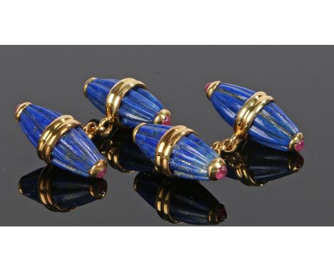 Pair of lapis lazuli and ruby cufflinks, the conical ended fluted carved lapis lazuli ends set with a ruby to each top