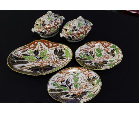 Spode type porcelain, to include two small tureens and covers, two stands and a dish 