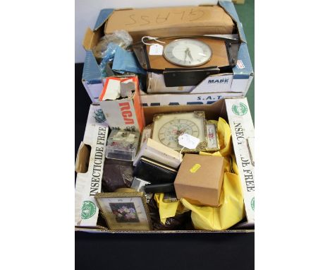 Cigarette lighters, quartz clock movements and accessories, mantel and alarm clocks, pair of plated goblets, two oil lamp gla