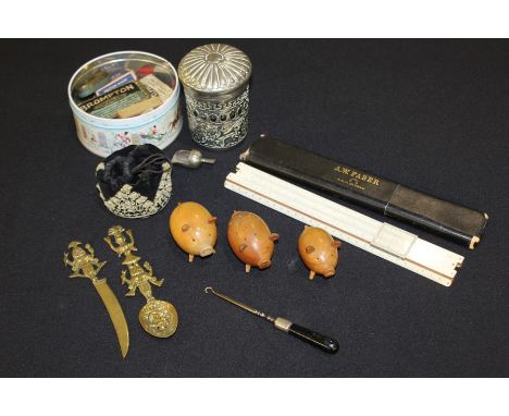 Collection of items, to include a caddy spoon, three turned pig peppers and salts, a silver plated pot and cover, a Fabers sl