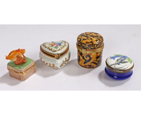 Four trinket boxes, three porcelain examples and an enamel example, (4)