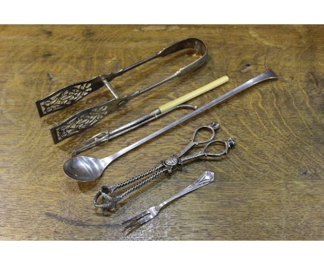 Pair of plates asparagus tongs, long handled pickle spoon, pickle fork, pair of scissor action ice tongs, WMF fork (5)