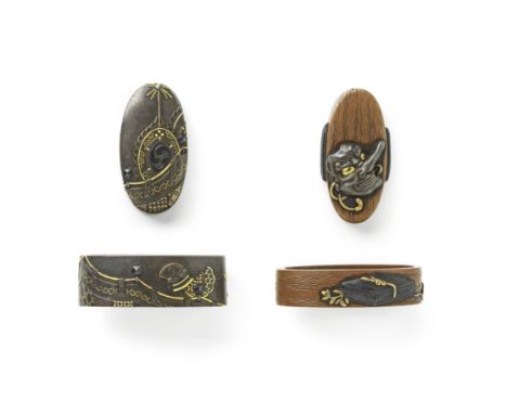 TWO FUCHI-GASHIRA (MATCHING HILT COLLARS AND POMMELS)Edo period (1615-1868), 18th and 19th centuryThe first shibuichi migakij