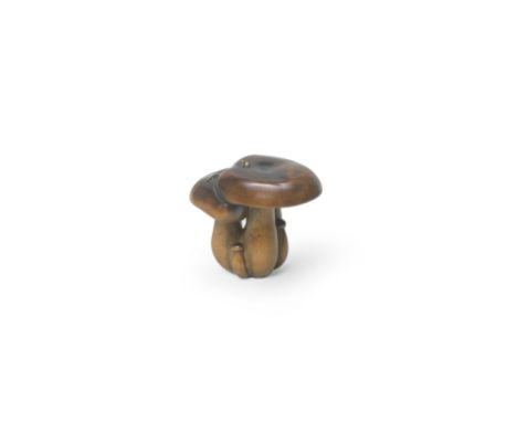 A WOOD NETSUKE OF A MUSHROOM CLUSTERBy Jikan Ganbun, Kyoto and Tokyo, late 19th centuryPossibly shimeji mushrooms, the cluste