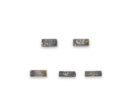 FIVE FUCHI (HILT COLLARS)Edo period (1615-1868), 18th to 19th centuryThe first three shakudo nanako, the first chiselled and 