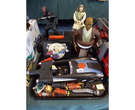 A Collection of Star Wars Figures and Other Toys 