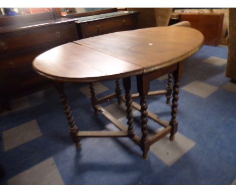 A Barley Twist Oval Top Drop Leaf Gate Legged Table 