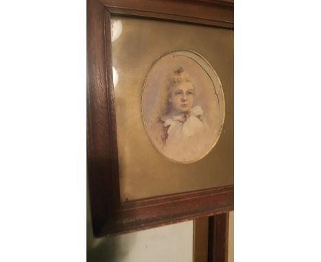 A collection of 4 portraits. A water colour, circa 1900 of a young lady, a pencil drawing of Russian Peasant children on a to