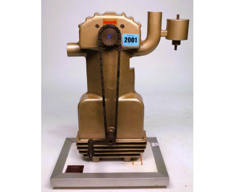 AN EARLY 20TH CENTURY GERMAN MODEL OF A TWO STROKE ENGINE