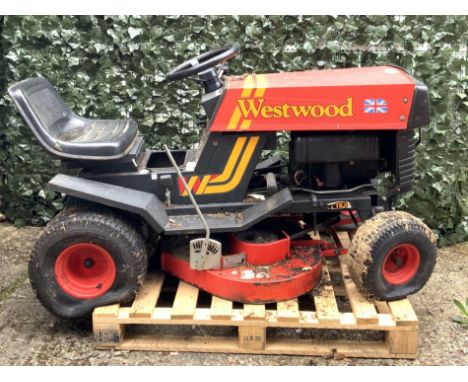 A WESTWOOD T1100 RIDE ON TRACTOR MOWERWith grass sweeperSold as seen. Personal viewing recommended.