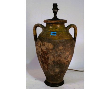 A TERRACOTTA TWIN HANDLED URN CONVERTED TO A TABLE LAMP, 50CM