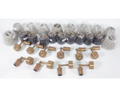 A SET OF TEN BRASS WALL LIGHTS WITH SHADES TOGETHER WITH NINE OTHER SHADES (19)Of recent manufactureBrass light 11.cm long; 1