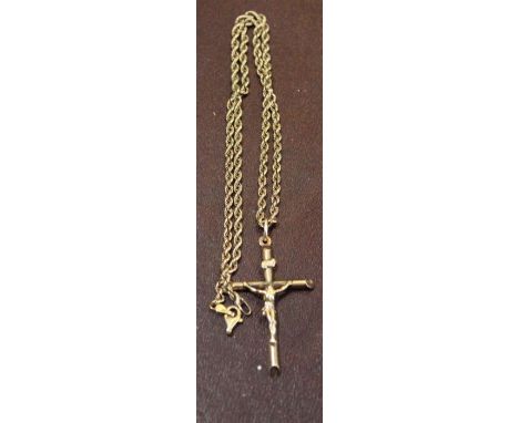 A 9ct gold Crucifix on a 9ct gold rope twist chain, combined weight 10g