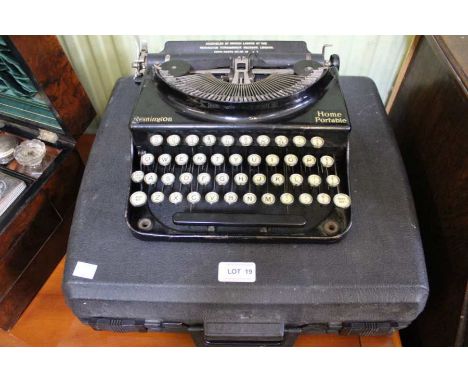 Cased Olympia typewriter and a vintage Remington Home Portable