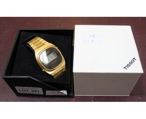 "Tissot" retro four function digital watch in original box. As new condition, new batteries and in full working order. Gold c