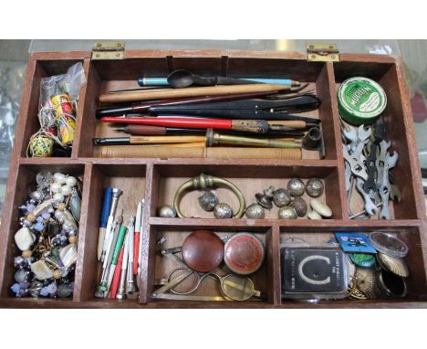 A wooden jewellery tool box containing tools, costume jewellery and assortment of other collectable items&nbsp;