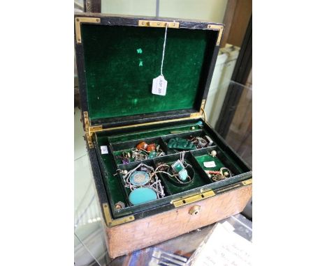 A Crocodile leather effect jewellery case with costume jewellery contents