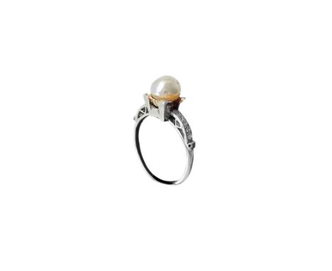 Platinum ring with pearl brill 8/8 12:20 AC gr 2