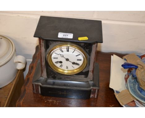 A Victorian marble mantel clock 